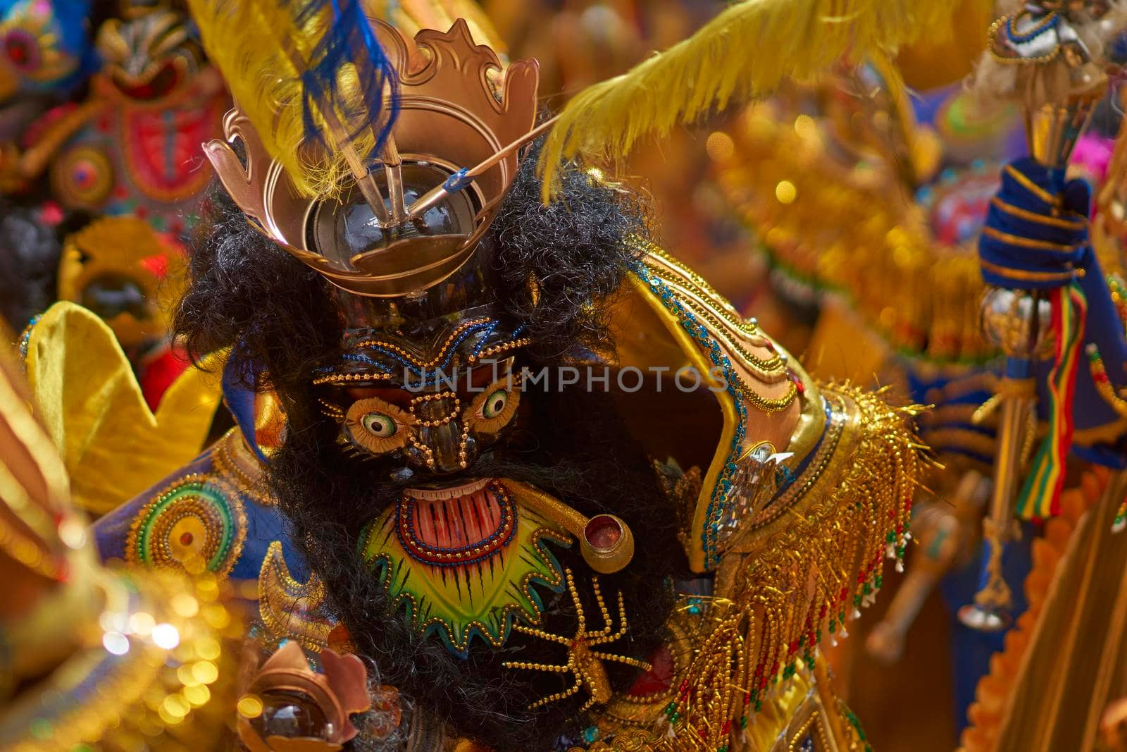 ORURO, BOLIVIA - FEBRUARY 25, 2017: Morenada dancers in ornate costumes parade through the mining city of Oruro on the Altiplano of Bolivia during the annual carnival.