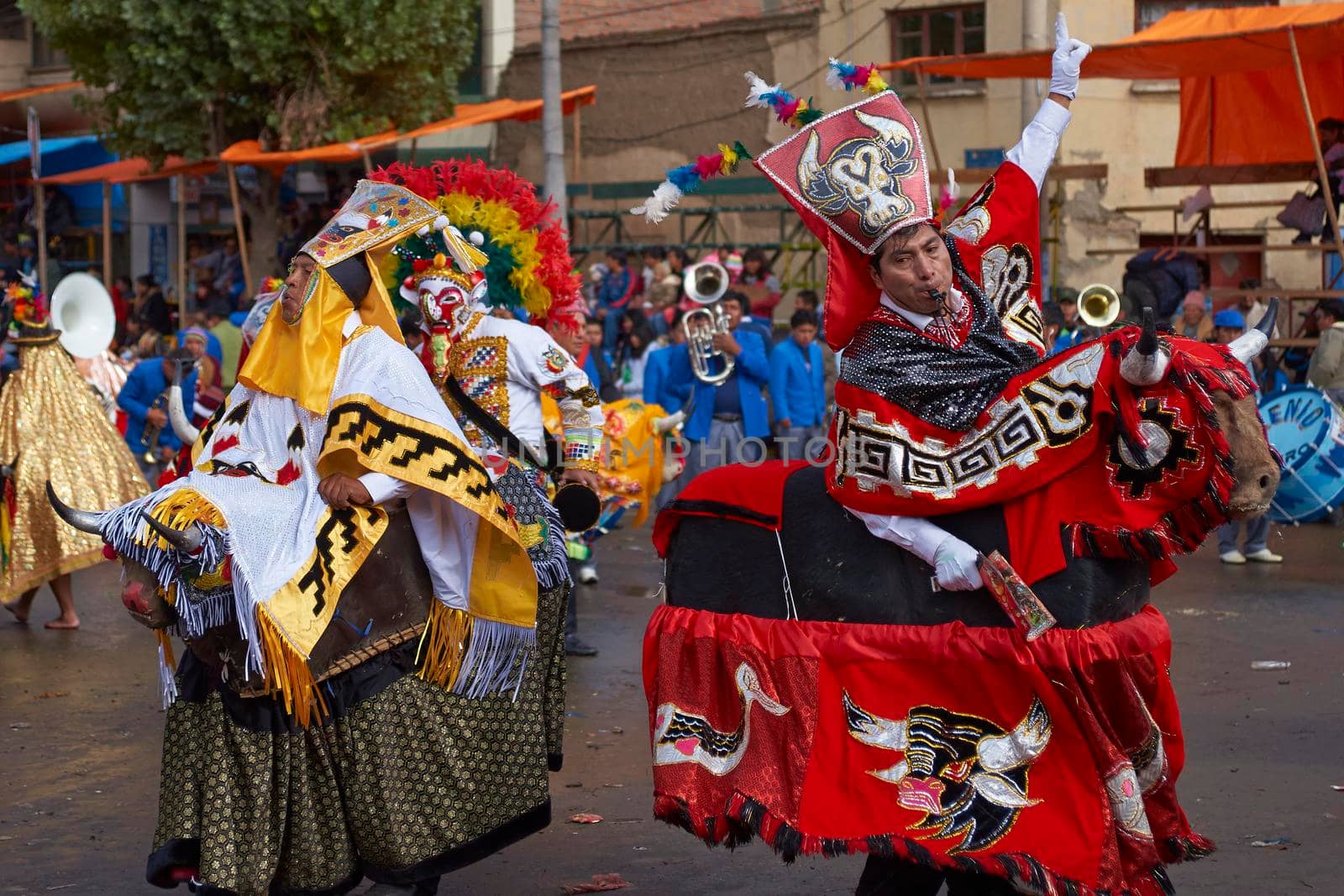 ORURO, BOLIVIA - FEBRUARY 25, 2017: Members of a Waca Waca dance group in ornate costume parade through the mining city of Oruro on the Altiplano of Bolivia during the annual carnival.