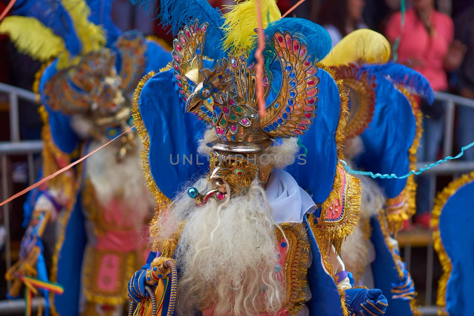 ORURO, BOLIVIA - FEBRUARY 25, 2017: Morenada dancers in ornate costumes parade through the mining city of Oruro on the Altiplano of Bolivia during the annual carnival.