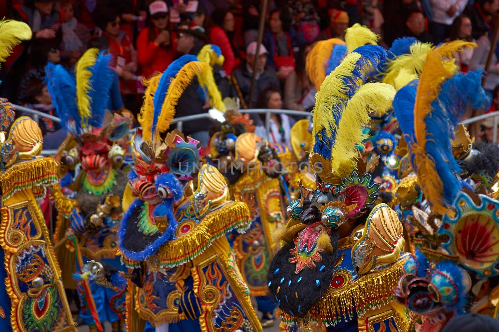 ORURO, BOLIVIA - FEBRUARY 25, 2017: Morenada dancers in ornate costumes parade through the mining city of Oruro on the Altiplano of Bolivia during the annual carnival.