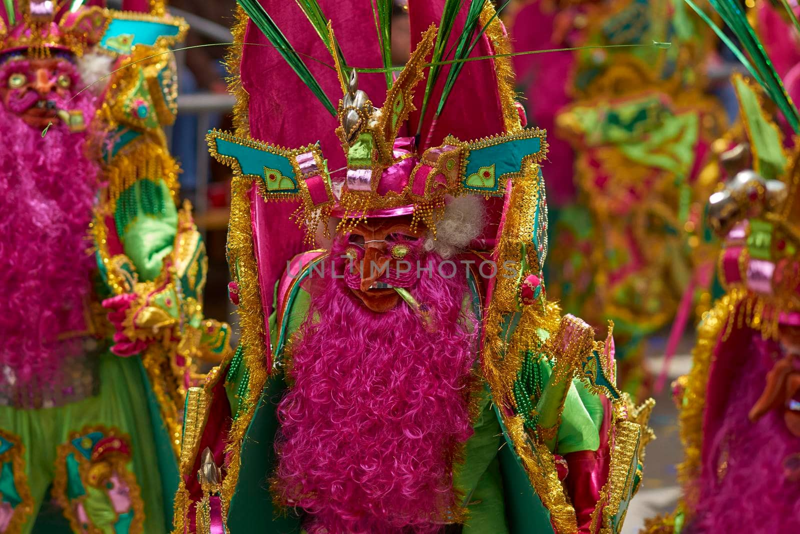 ORURO, BOLIVIA - FEBRUARY 25, 2017: Morenada dancers in ornate costumes parade through the mining city of Oruro on the Altiplano of Bolivia during the annual carnival.