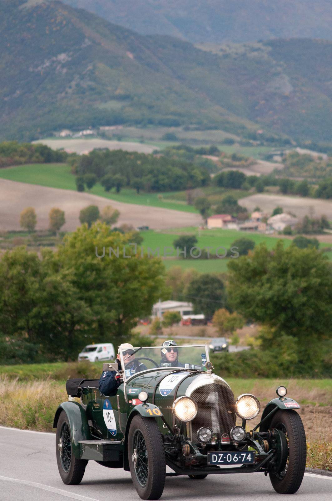 CAGLI , ITALY - OTT 24 - 2020 : BENTLEY 3 LITRI on an old racing car in rally Mille Miglia 2020 the famous italian historical race (1927-1957)