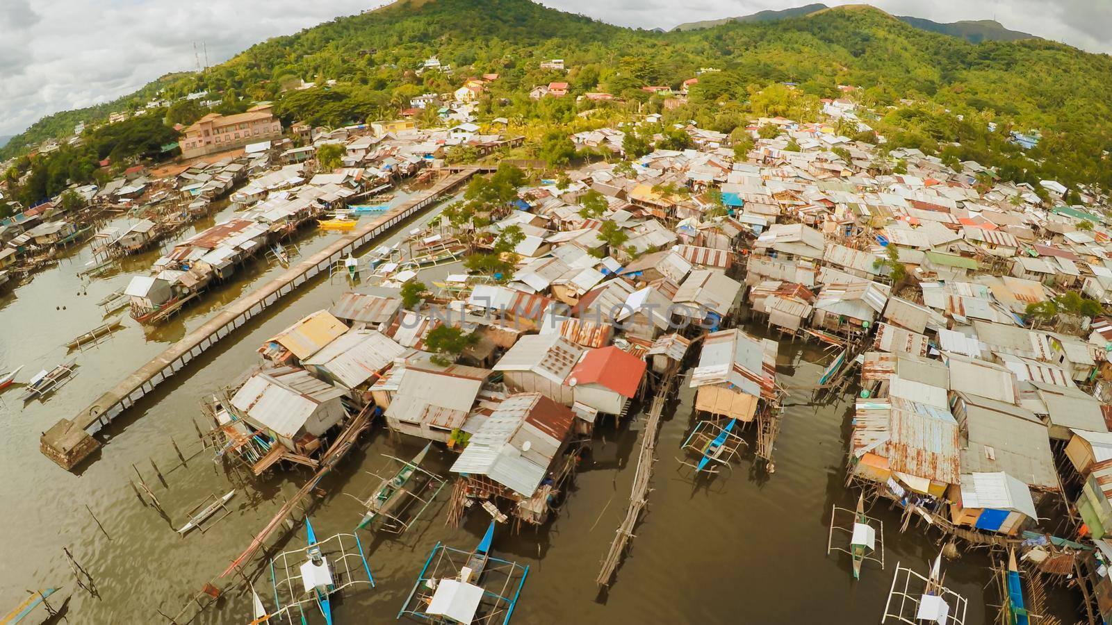 Philippine slums on the beach. Poor area of the city. Coron. Palawan. Philippines