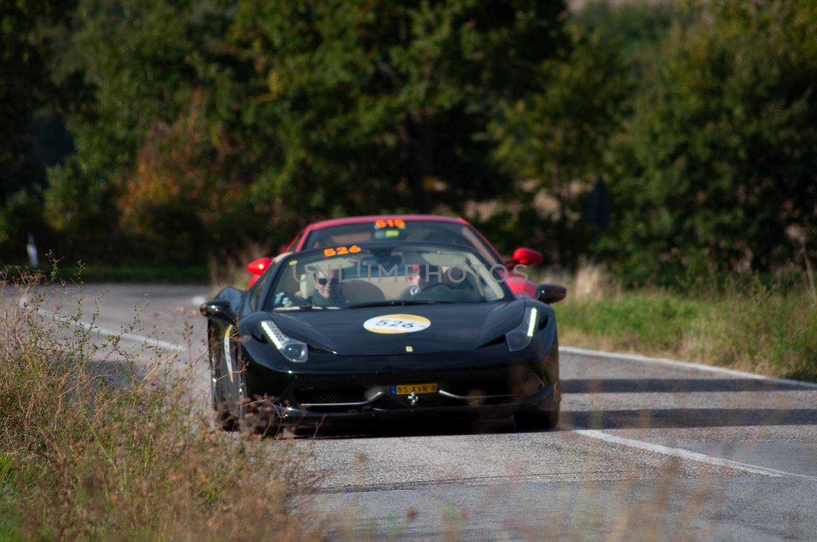 FERRARI 458 SPIDER on an old racing car in rally Mille Miglia 2020 the famous italian historical race (1927-1957) by massimocampanari