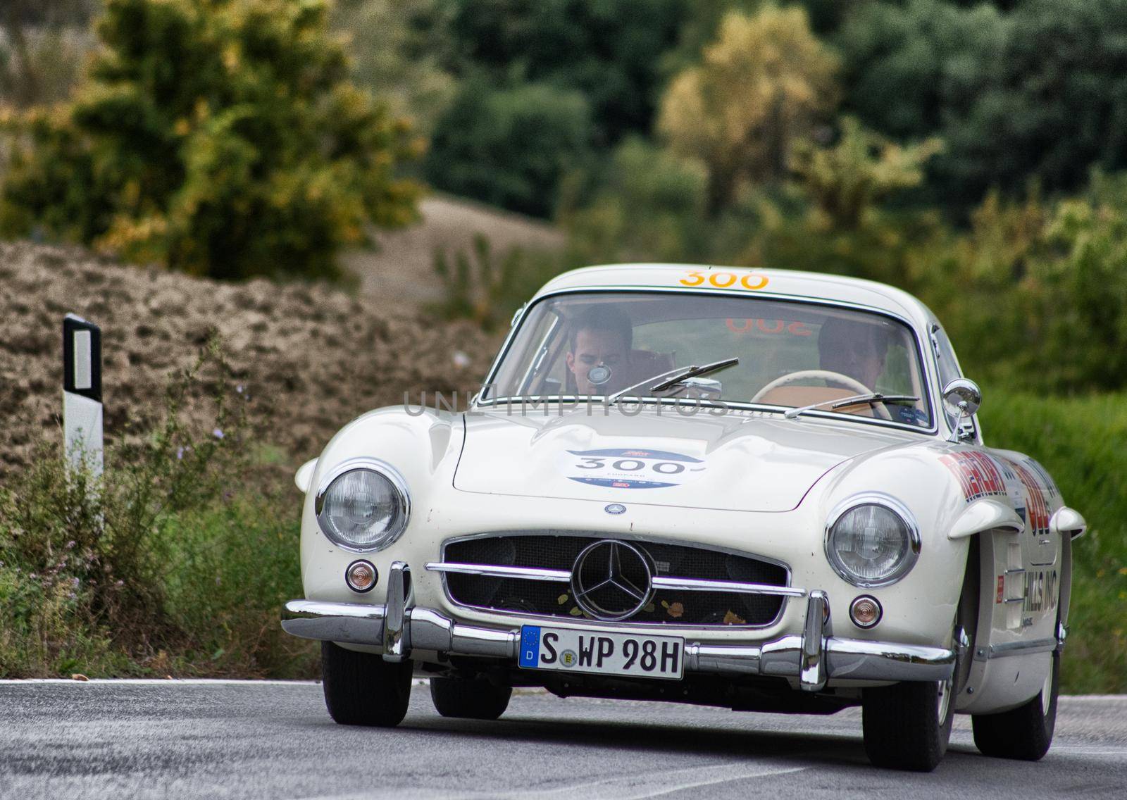 CAGLI , ITALY - OTT 24 - 2020 : MERCEDES 300 SL on an old racing car in rally Mille Miglia 2020 the famous italian historical race (1927-1957)