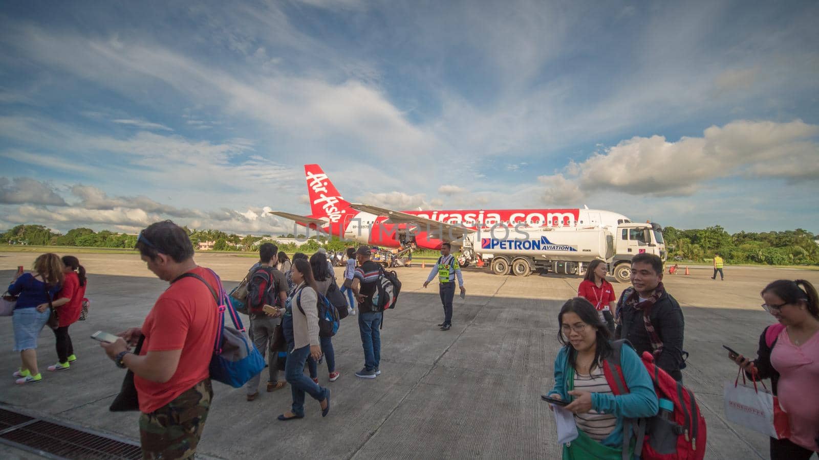 Tagbilaran, Phllipines - February 1, 2018: Loading Luggage into the plane at the airport of Tagbilaran