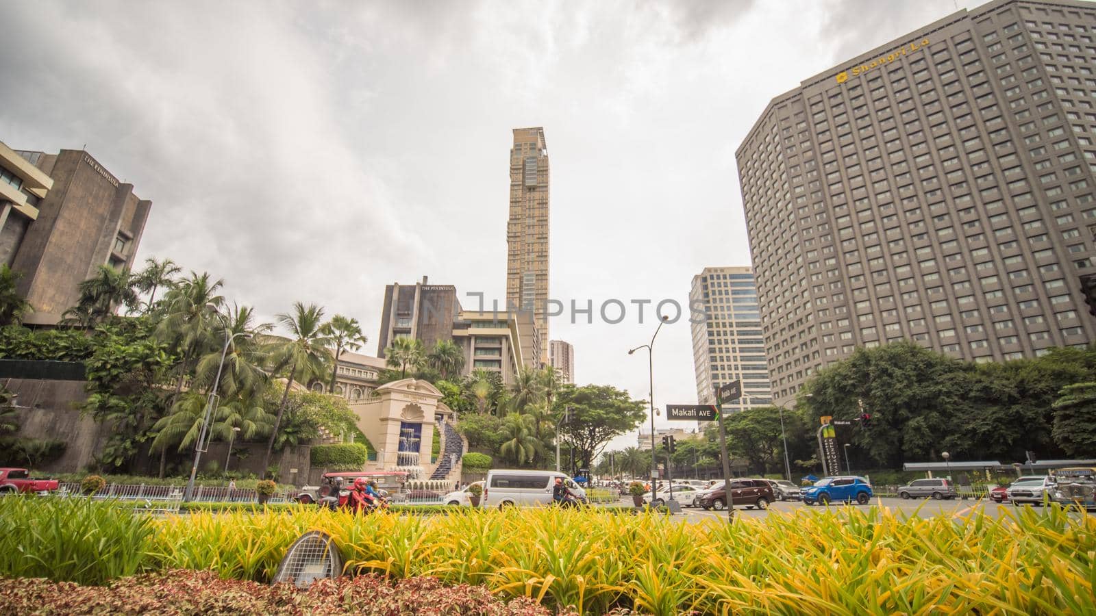 MANILA, PHILIPPINES - NOVEMBER 28, 2017: Makati in Metro Manila, The Philippines. Skyscrapers of the district. by DovidPro