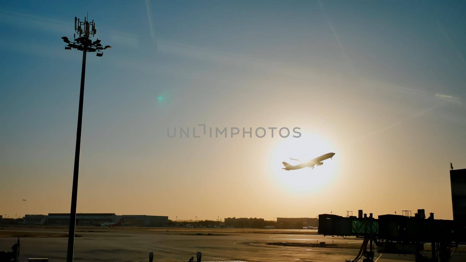 Plane taking off sky sunset sun dusk in airport China. Beijing