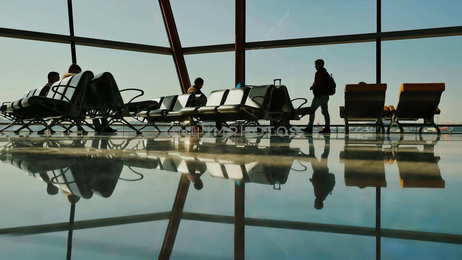 People at a modern airport, departure lounge