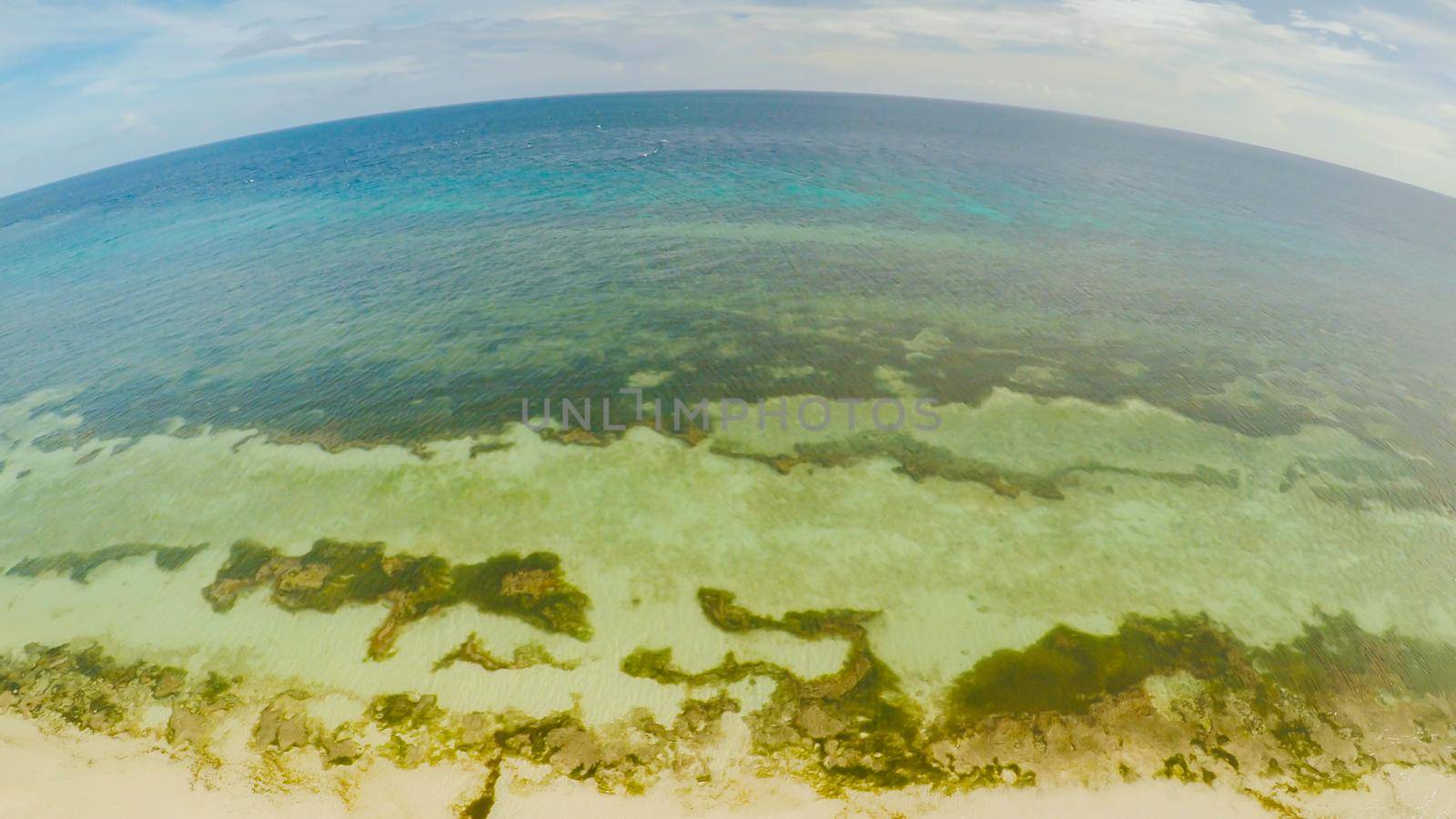 The ocean coast with beautiful coral reefs and views. Aerial view