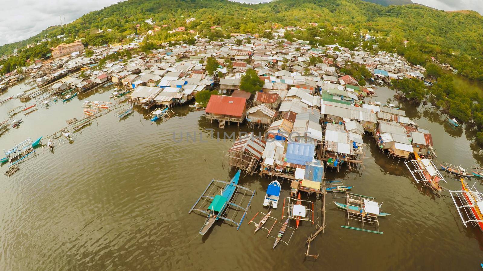 Philippine slums on the beach. Poor area of the city. Coron. Palawan. Philippines