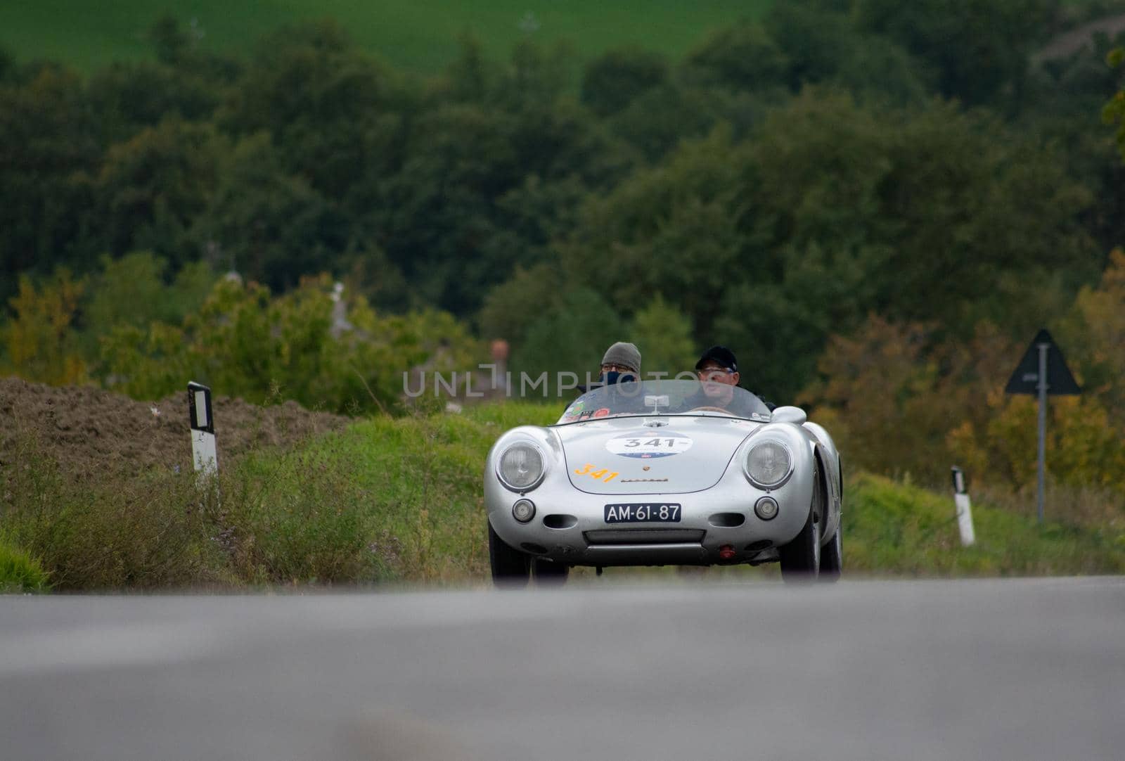 CAGLI , ITALY - OTT 24 - 2020 : PORSCHE 550 SPIDER RS on an old racing car in rally Mille Miglia 2020 the famous italian historical race (1927-1957)