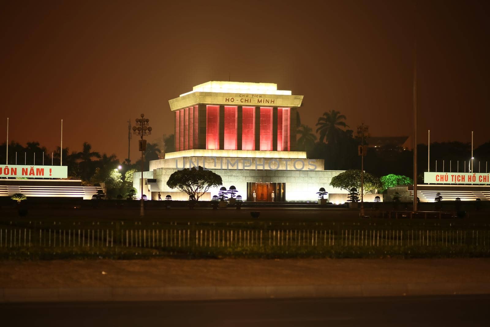 Night photo of the Ho Chi Minh Mausoleum in Hanoi, Vietnam.