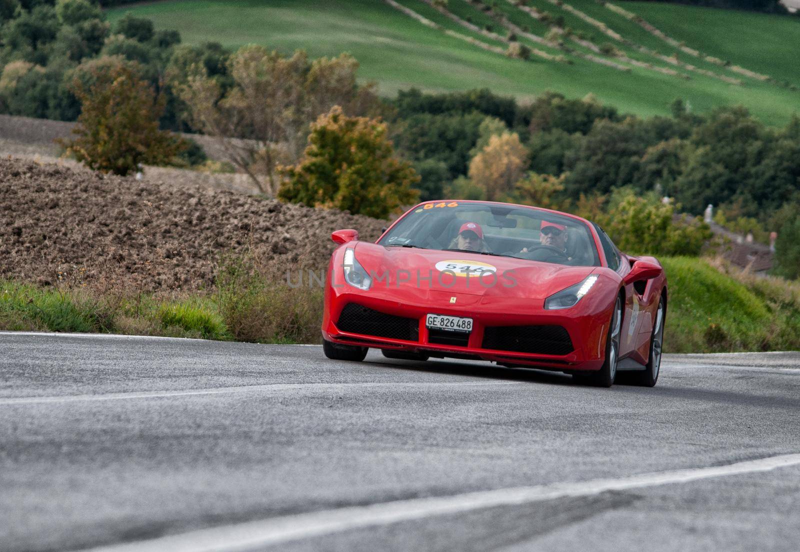 CAGLI , ITALY - OTT 24 - 2020 : FERRARI 488 SPIDER on an old racing car in rally Mille Miglia