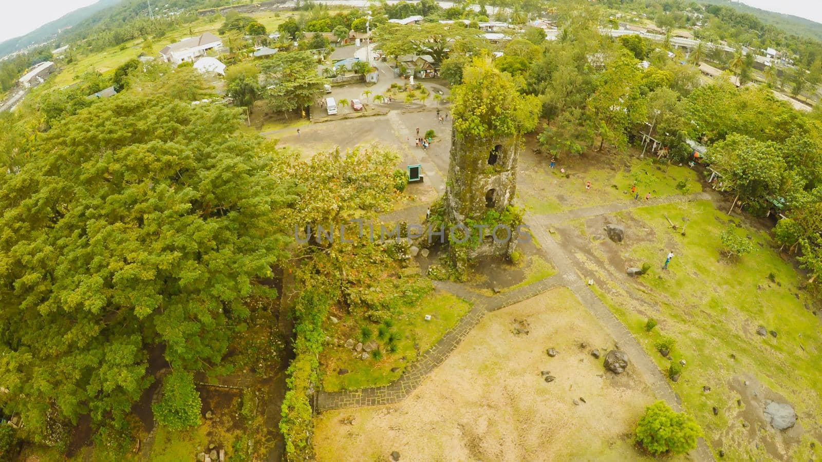 Aerial views the ruins of Cagsawa church, showing Mount Mayon erupting in the background. Cagsawa church. Philippines
