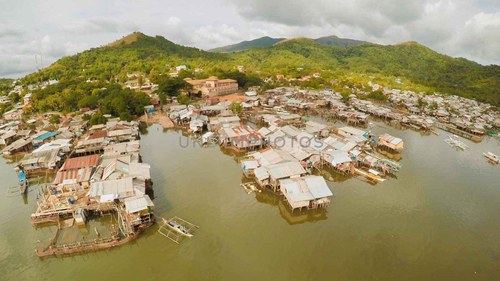 Philippine slums on the beach. Poor area of the city. Coron. Palawan. Philippines