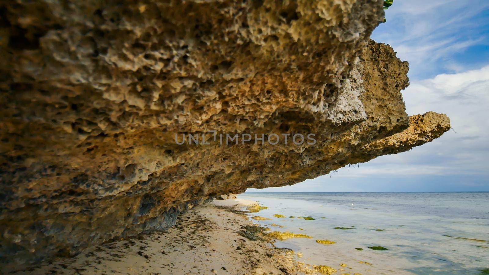 Beautiful wild tropical beach near Anda with granite rocks. Bohol Island. Philippines