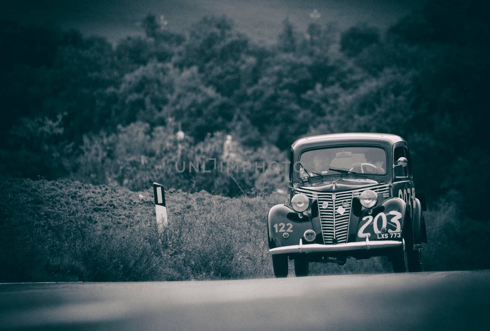 CAGLI , ITALY - OTT 24 - 2020 : FIAT 1099 MUSONE 1947 on an old racing car in rally Mille Miglia 2020 the famous italian historical race (1927-1957)