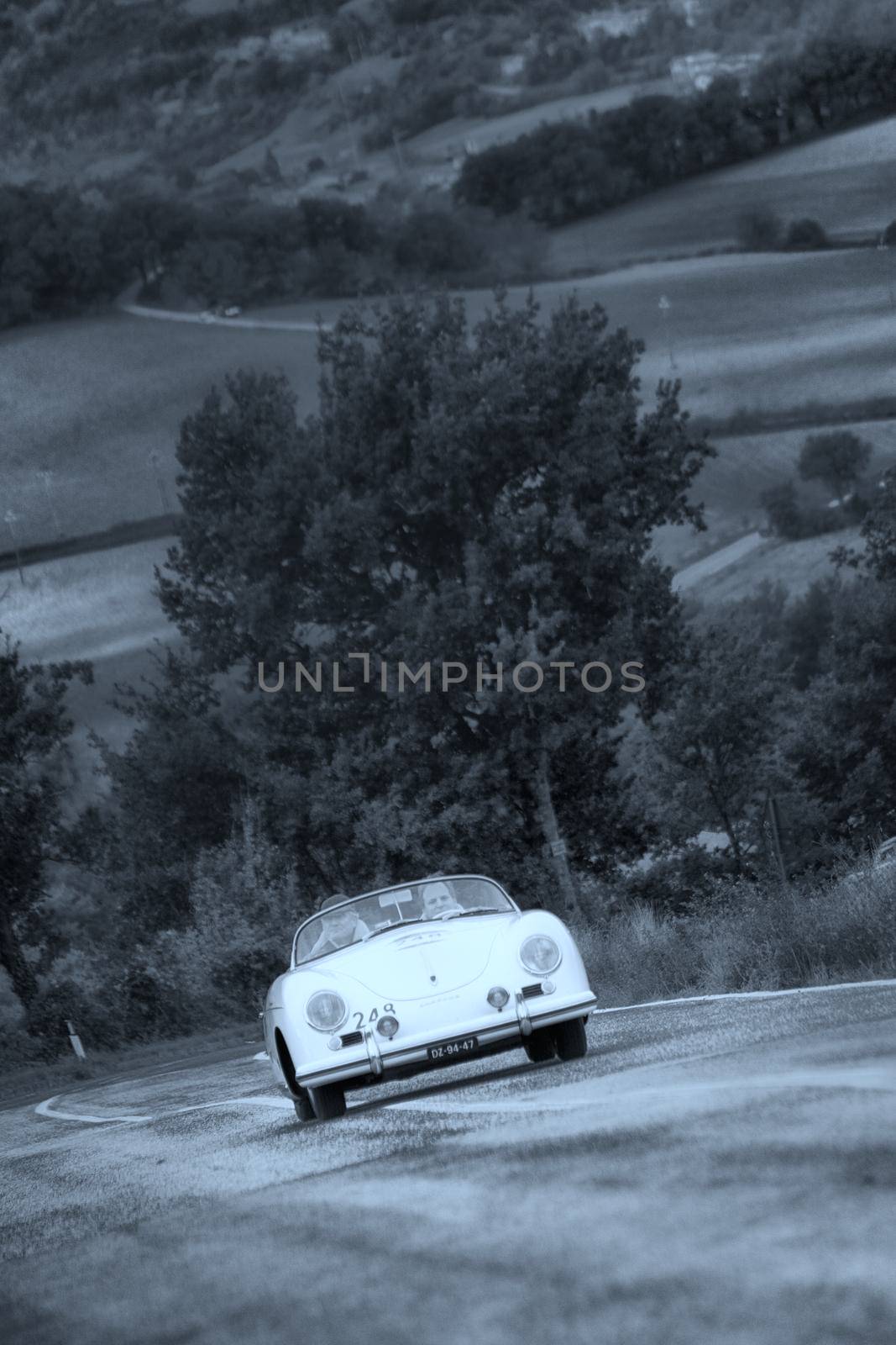 CAGLI , ITALY - OTT 24 - 2020 : PORSCHE 356 SPEEDSTER 1500 1955 on an old racing car in rally Mille Miglia 2020 the famous italian historical race (1927-1957)