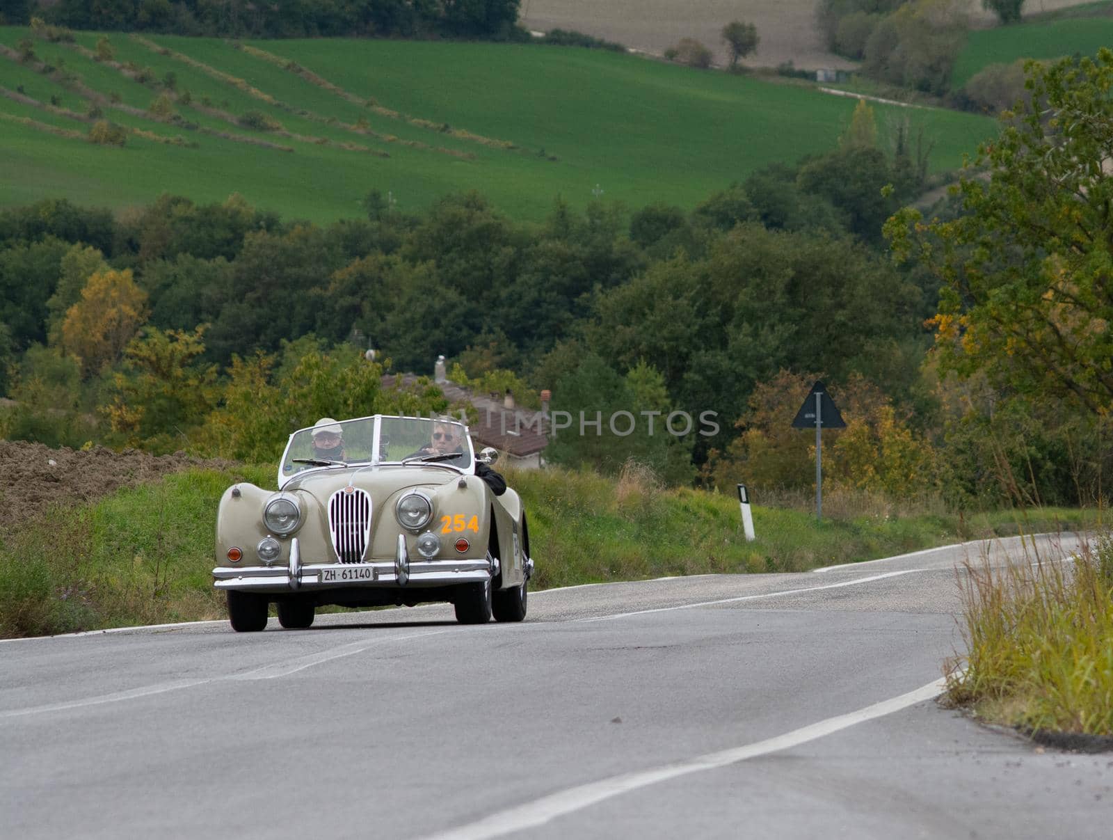 JAGUAR XK 140 OTS SE 1954 on an old racing car in rally Mille Miglia 2020 the famous italian historical race (1927-1957 by massimocampanari