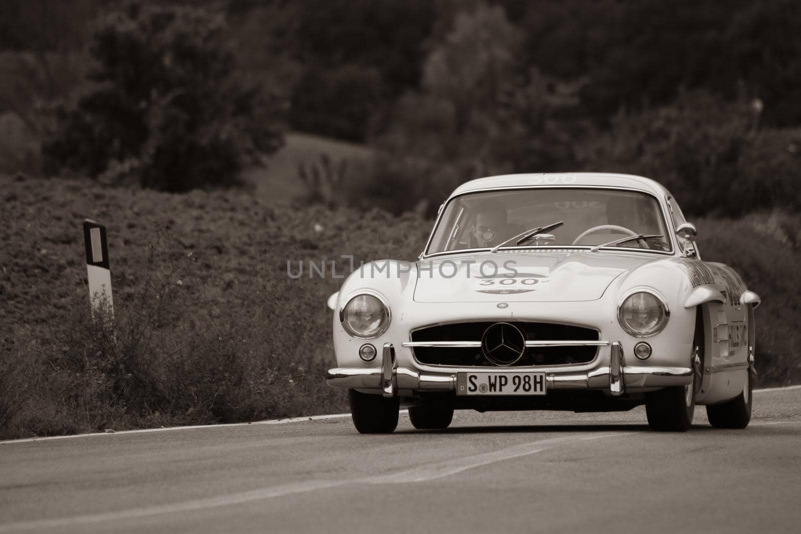 CAGLI , ITALY - OTT 24 - 2020 : MERCEDES-BENZ 300 SL W 198 1954 on an old racing car in rally Mille Miglia 2020 the famous italian historical race (1927-1957)
