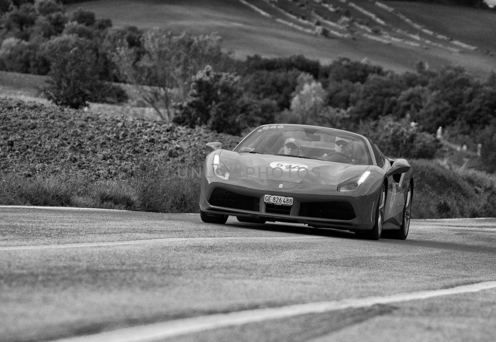 CAGLI , ITALY - OTT 24 - 2020 : FERRARI 488 SPIDER on an old racing car in rally Mille Miglia