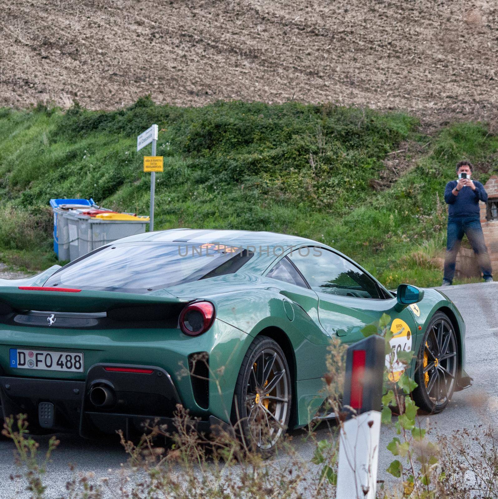 CAGLI , ITALY - OTT 24 - 2020 : FERRARI 488 PISTA on an old racing car in rally Mille Miglia 2020 the famous italian historical race (1927-1957)