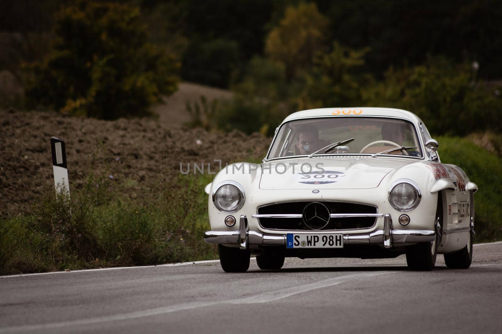 CAGLI , ITALY - OTT 24 - 2020 : MERCEDES-BENZ 300 SL W 198 1954 on an old racing car in rally Mille Miglia 2020 the famous italian historical race (1927-1957)