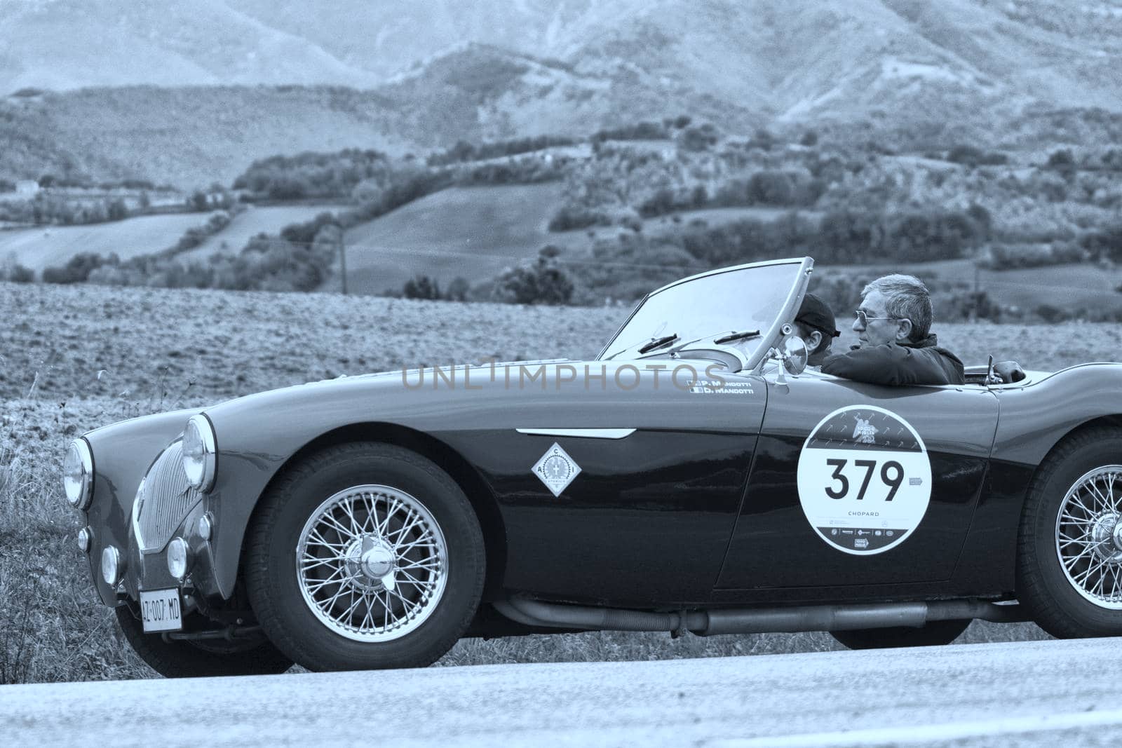 AUSTIN HEALEY 100/4 BN2 1956 on an old racing car in rally Mille Miglia 2020 the famous italian historical race (1927-1957) by massimocampanari