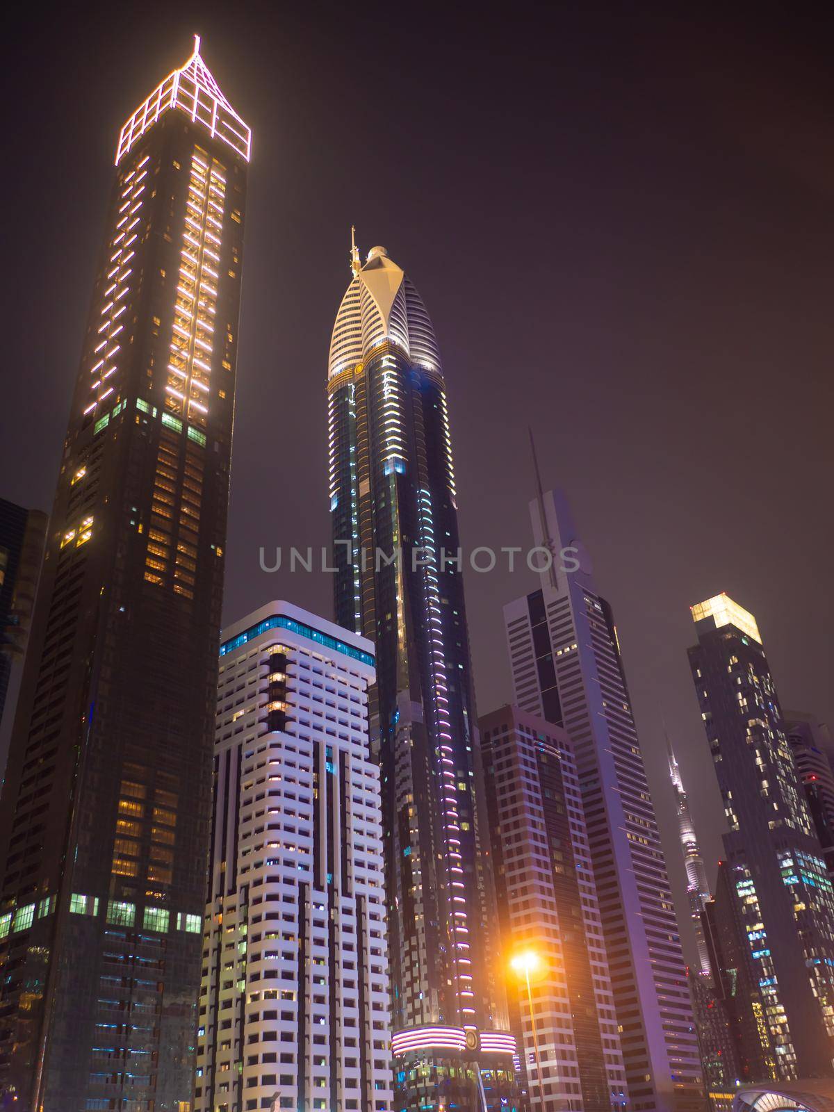 Night view of Dubai Downtown with skyscrapers