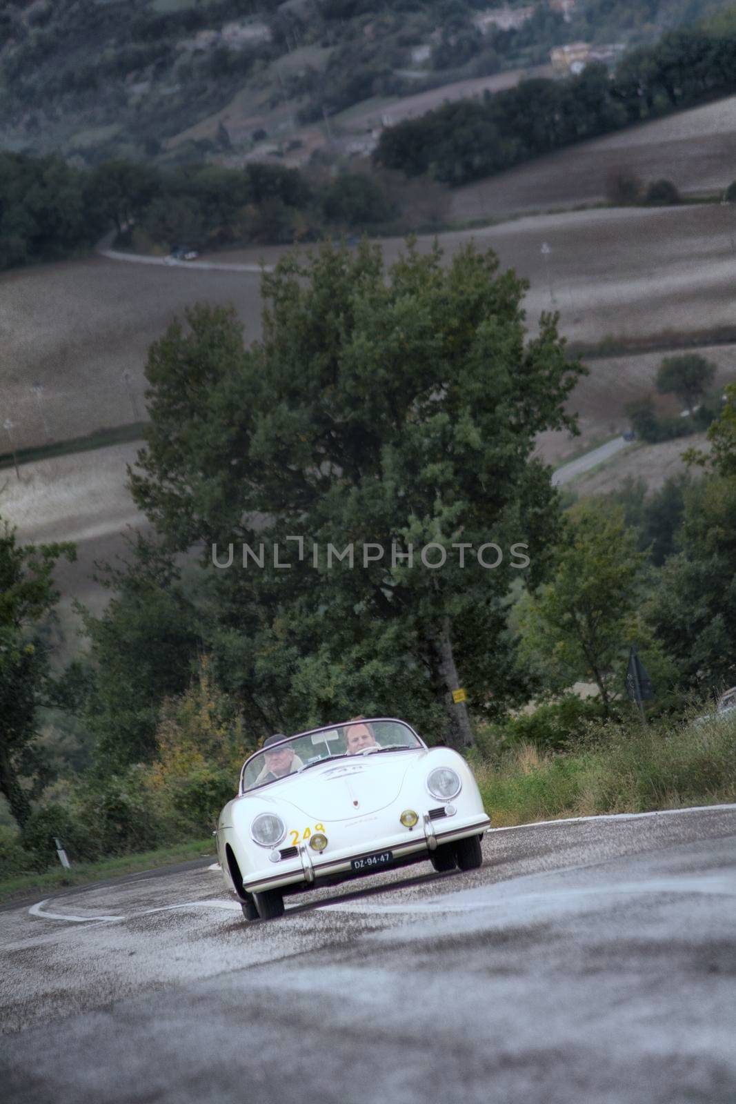 CAGLI , ITALY - OTT 24 - 2020 : PORSCHE 356 SPEEDSTER 1500 1955 on an old racing car in rally Mille Miglia 2020 the famous italian historical race (1927-1957)