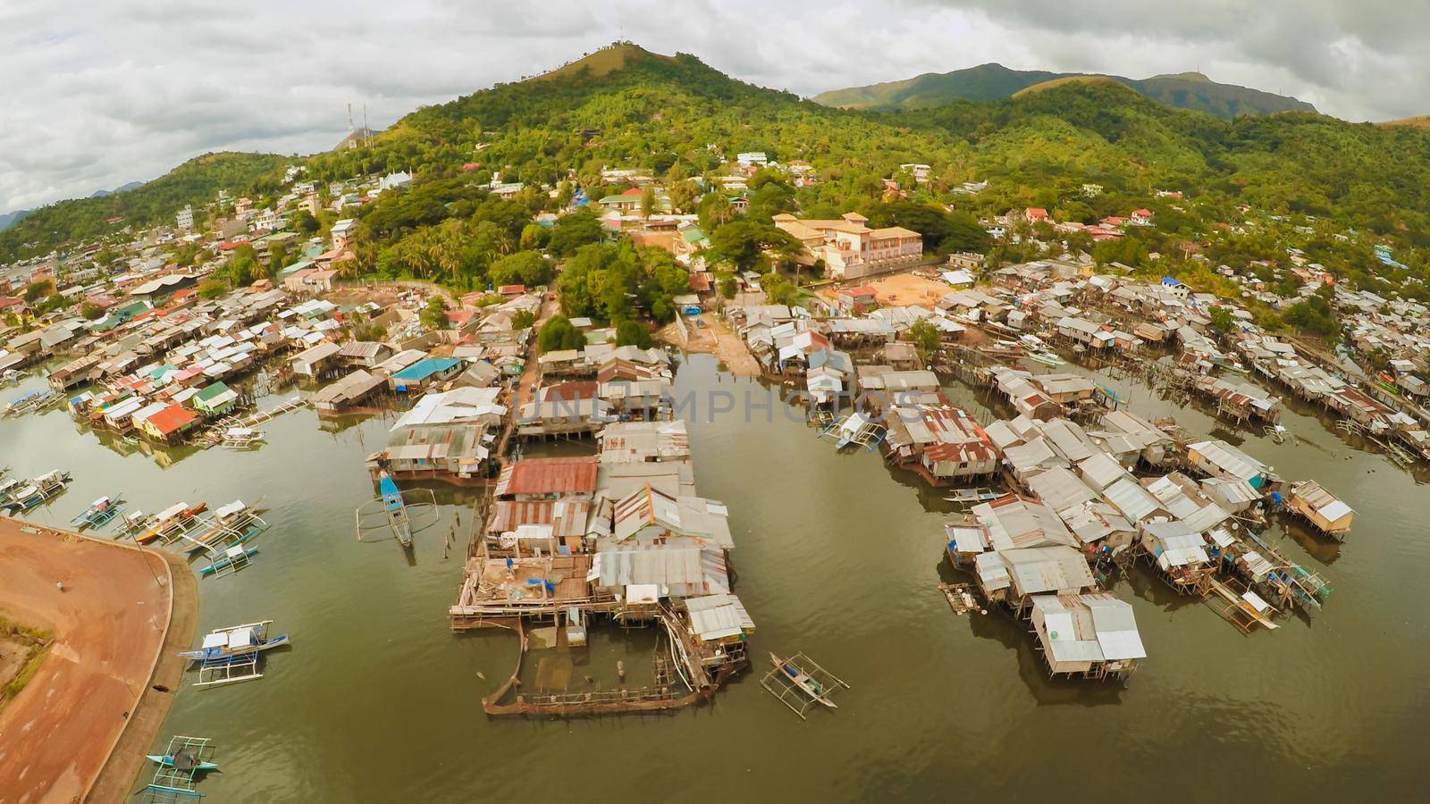 Philippine slums on the beach. Poor area of the city. Coron. Palawan. Philippines
