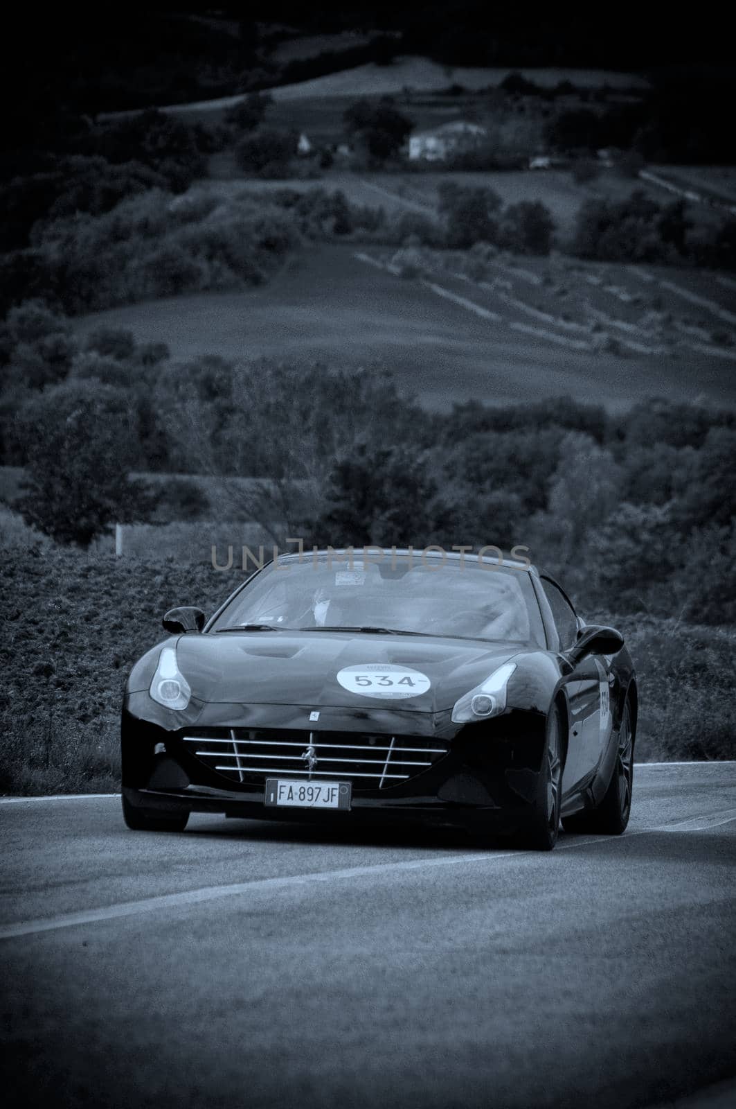 CALIFORNIA T 2015 on an old racing car in rally Mille Miglia 2020 the famous italian historical race (1927-1957) by massimocampanari