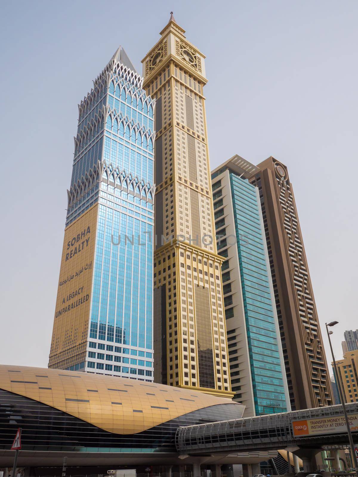 Dubai, UAE - May 15, 2018: Skyscrapers on Sheikh Zayed Road in Dubai. by DovidPro