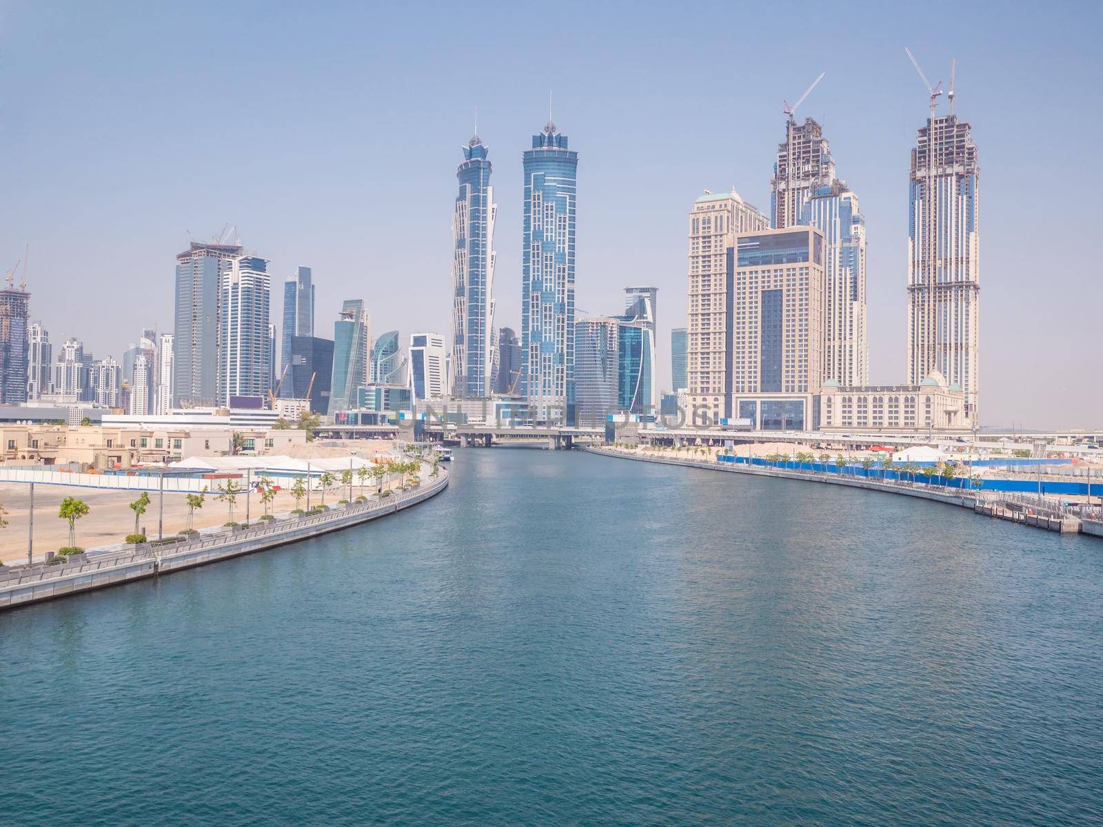 Panorama of the city of Dubai from the bridge of the river channel Dubai Creek.