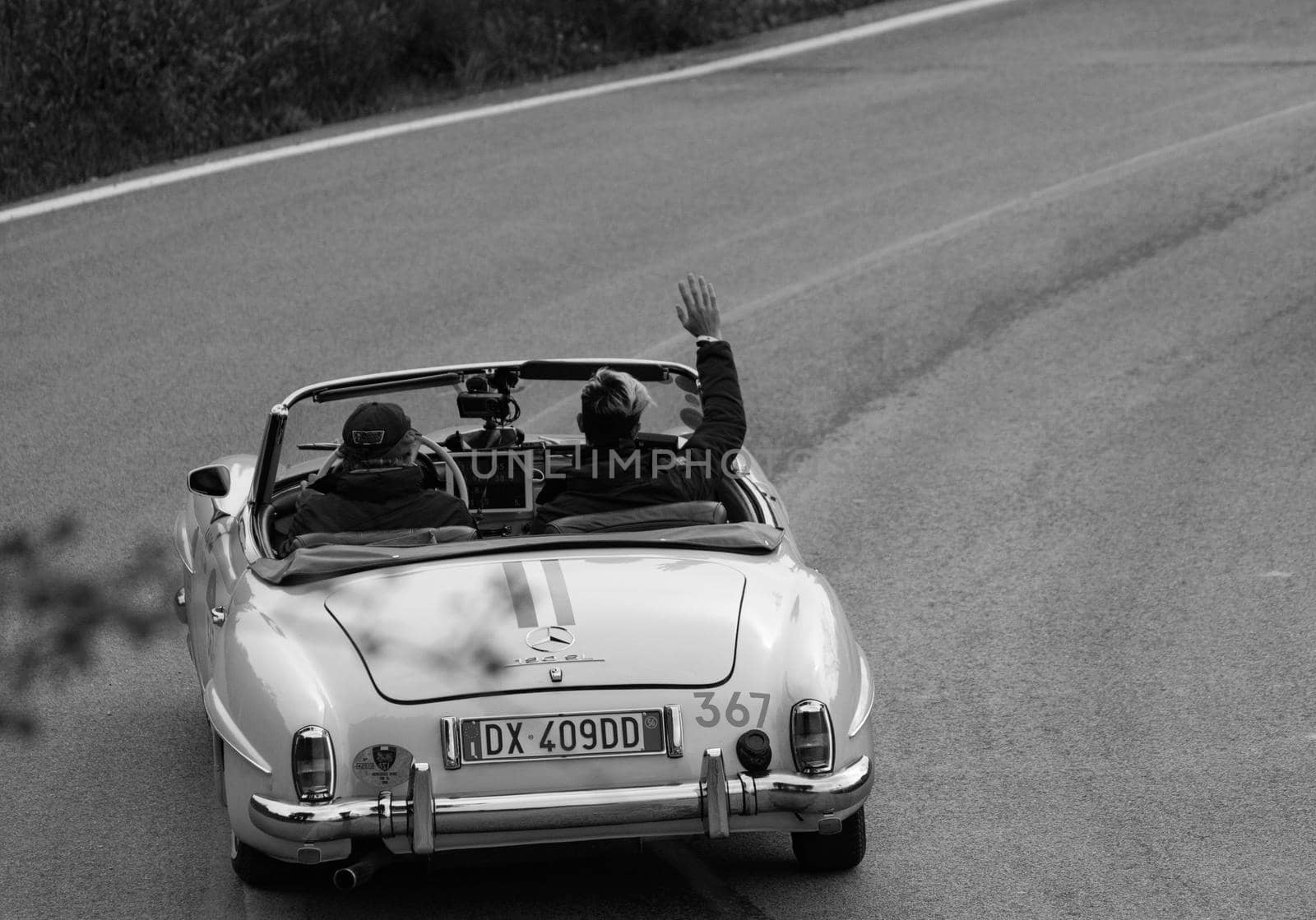 CAGLI , ITALY - OTT 24 - 2020 : MERCEDES-BENZ 190 SL 1956 on an old racing car in rally Mille Miglia 2020 the famous italian historical race (1927-1957