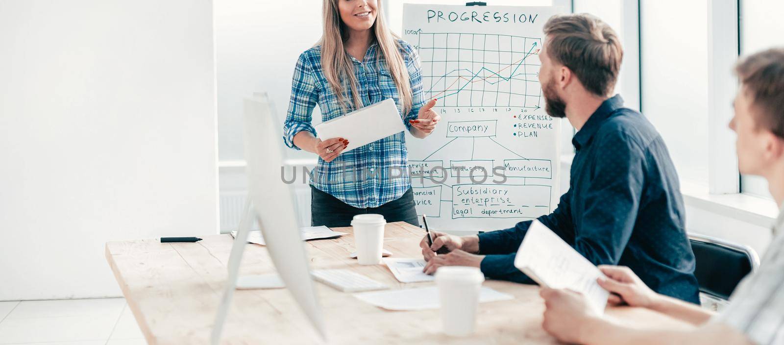 business woman at a meeting with the business team. by SmartPhotoLab