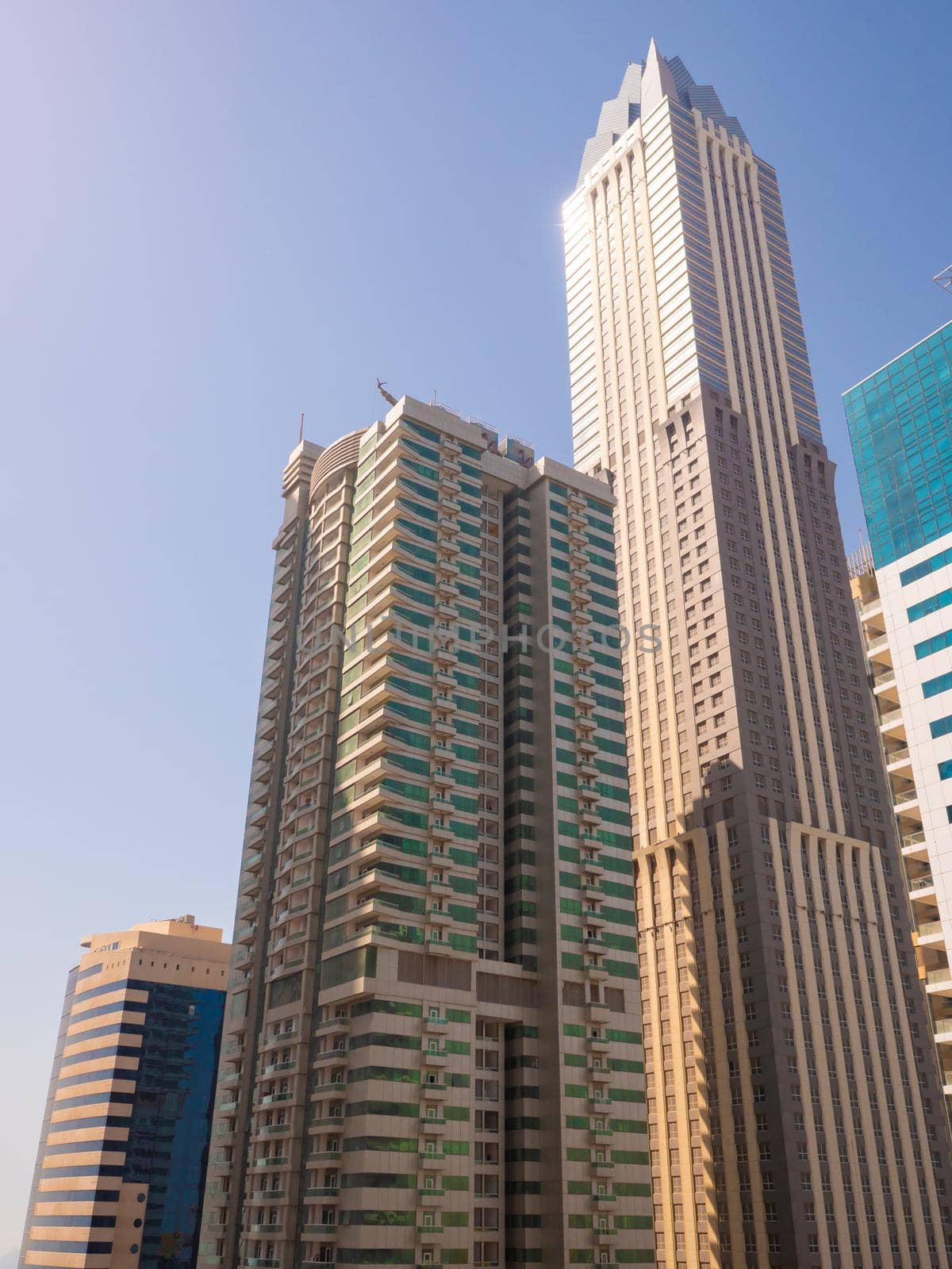 Residential skyscraper in Dubai on a sunny day. UAE