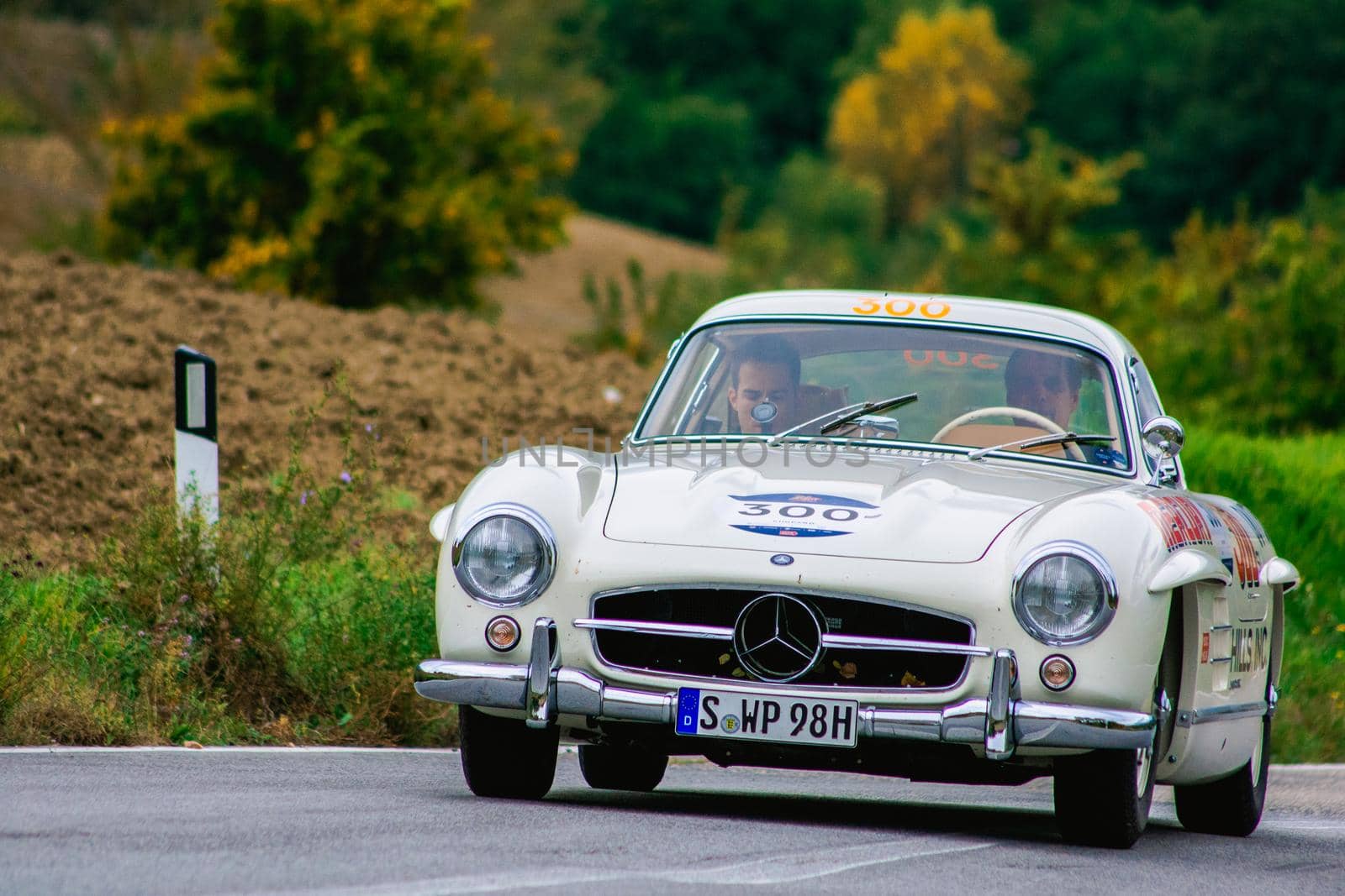 CAGLI , ITALY - OTT 24 - 2020 : MERCEDES-BENZ 300 SL W 198 1954 on an old racing car in rally Mille Miglia 2020 the famous italian historical race (1927-1957)