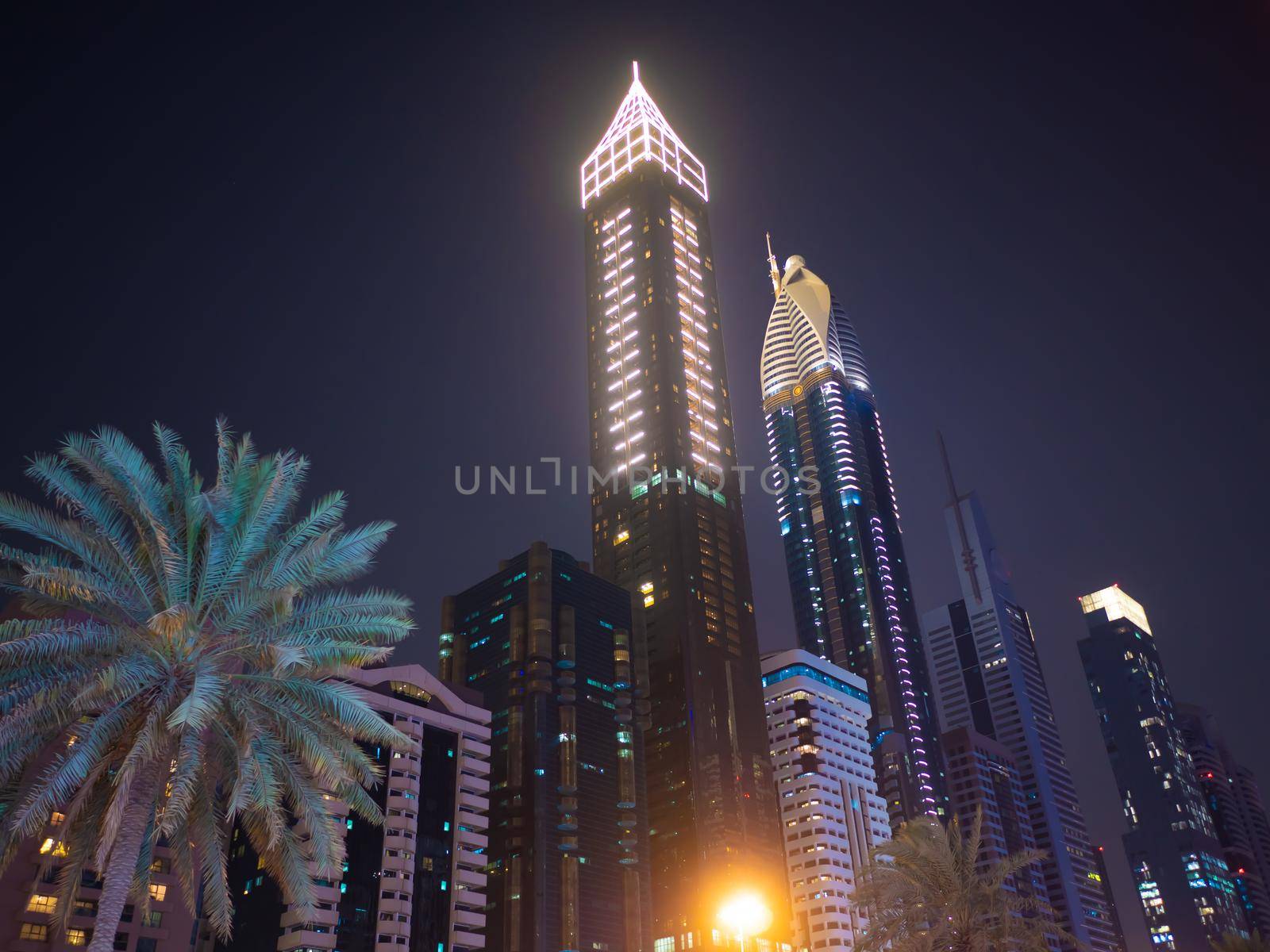 Night view of Dubai Downtown with skyscrapers. by DovidPro