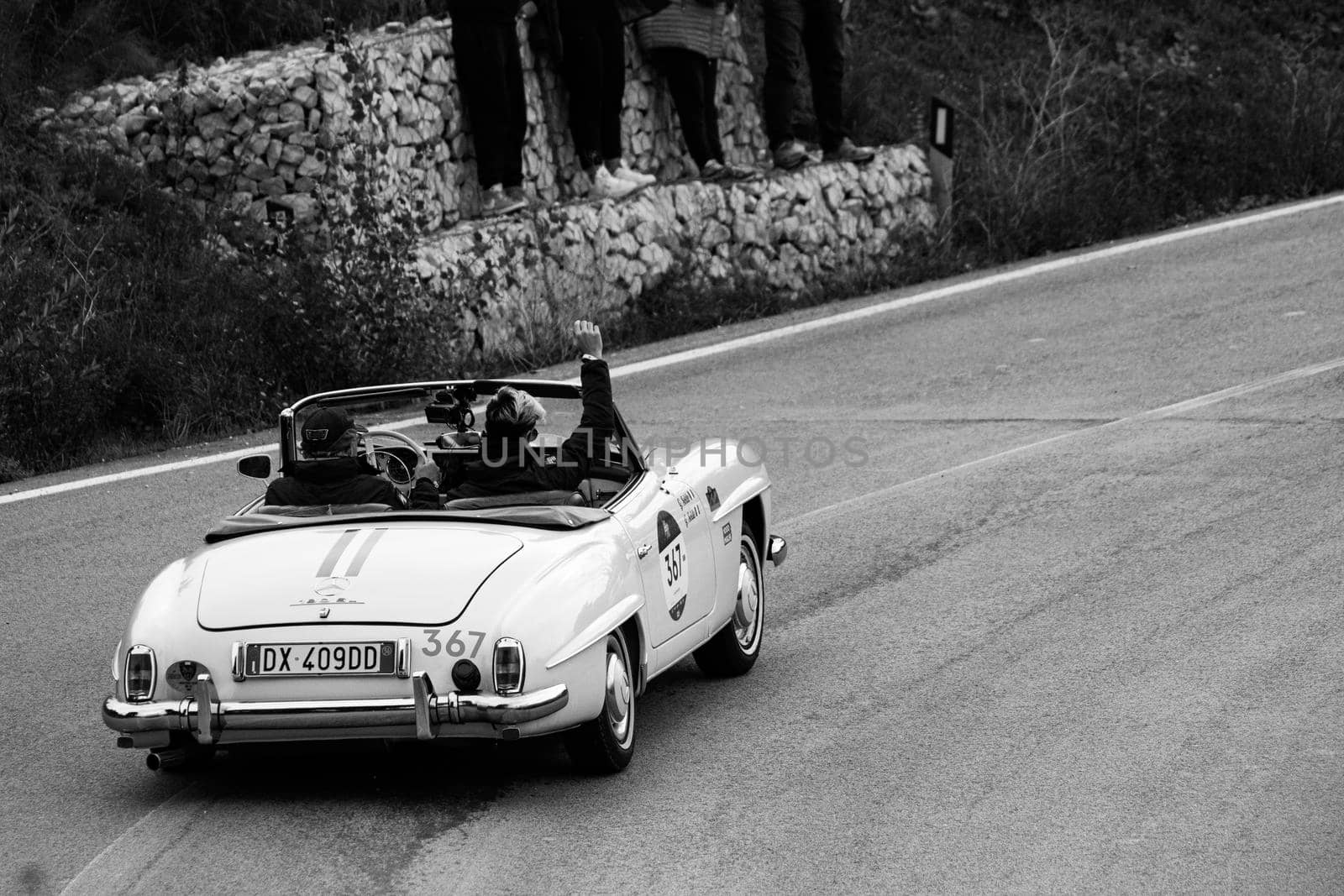 CAGLI , ITALY - OTT 24 - 2020 : MERCEDES-BENZ 190 SL 1956 on an old racing car in rally Mille Miglia 2020 the famous italian historical race (1927-1957