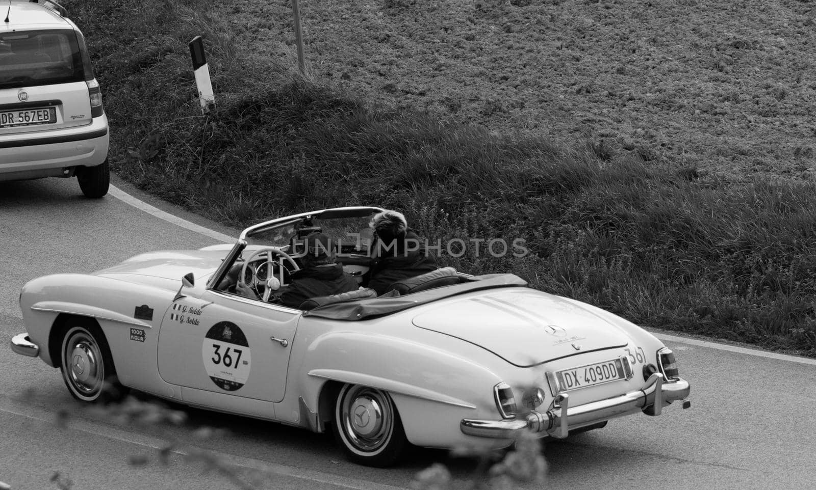 CAGLI , ITALY - OTT 24 - 2020 : MERCEDES-BENZ 190 SL 1956 on an old racing car in rally Mille Miglia 2020 the famous italian historical race (1927-1957