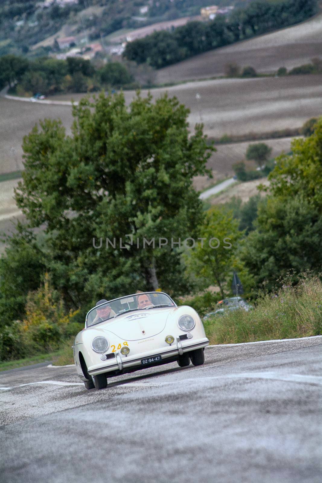 CAGLI , ITALY - OTT 24 - 2020 : PORSCHE 356 SPEEDSTER 1500 1955 on an old racing car in rally Mille Miglia 2020 the famous italian historical race (1927-1957)