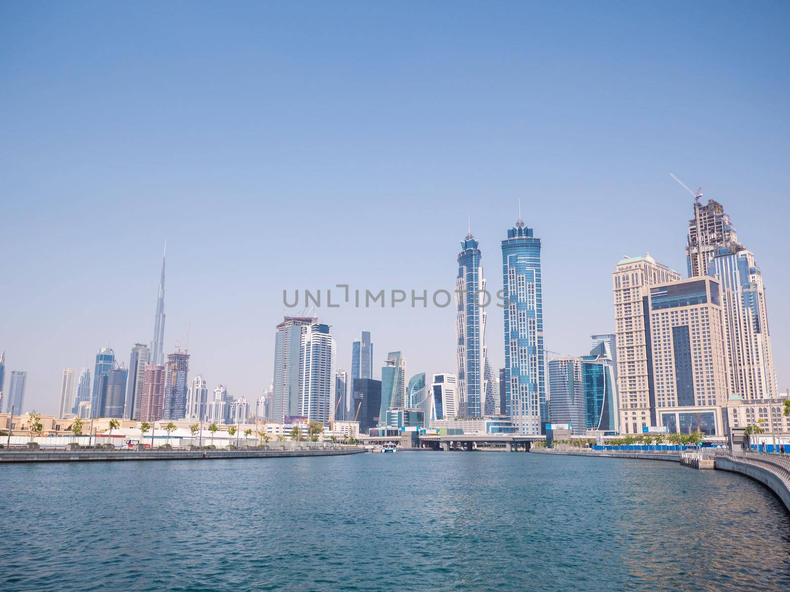 Panorama of the city of Dubai from the bridge of the river channel Dubai Creek.