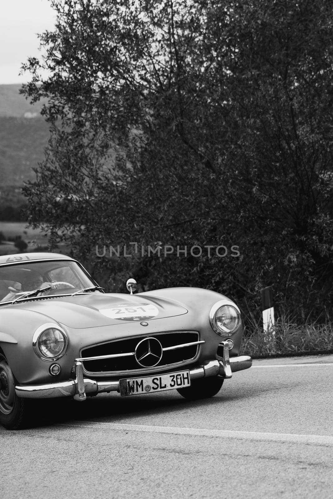 CAGLI , ITALY - OTT 24 - 2020 : MERCEDES-BENZ 300 SL W 198 1954 an old racing car in rally Mille Miglia 2020 the famous italian historical race (1927-1957)