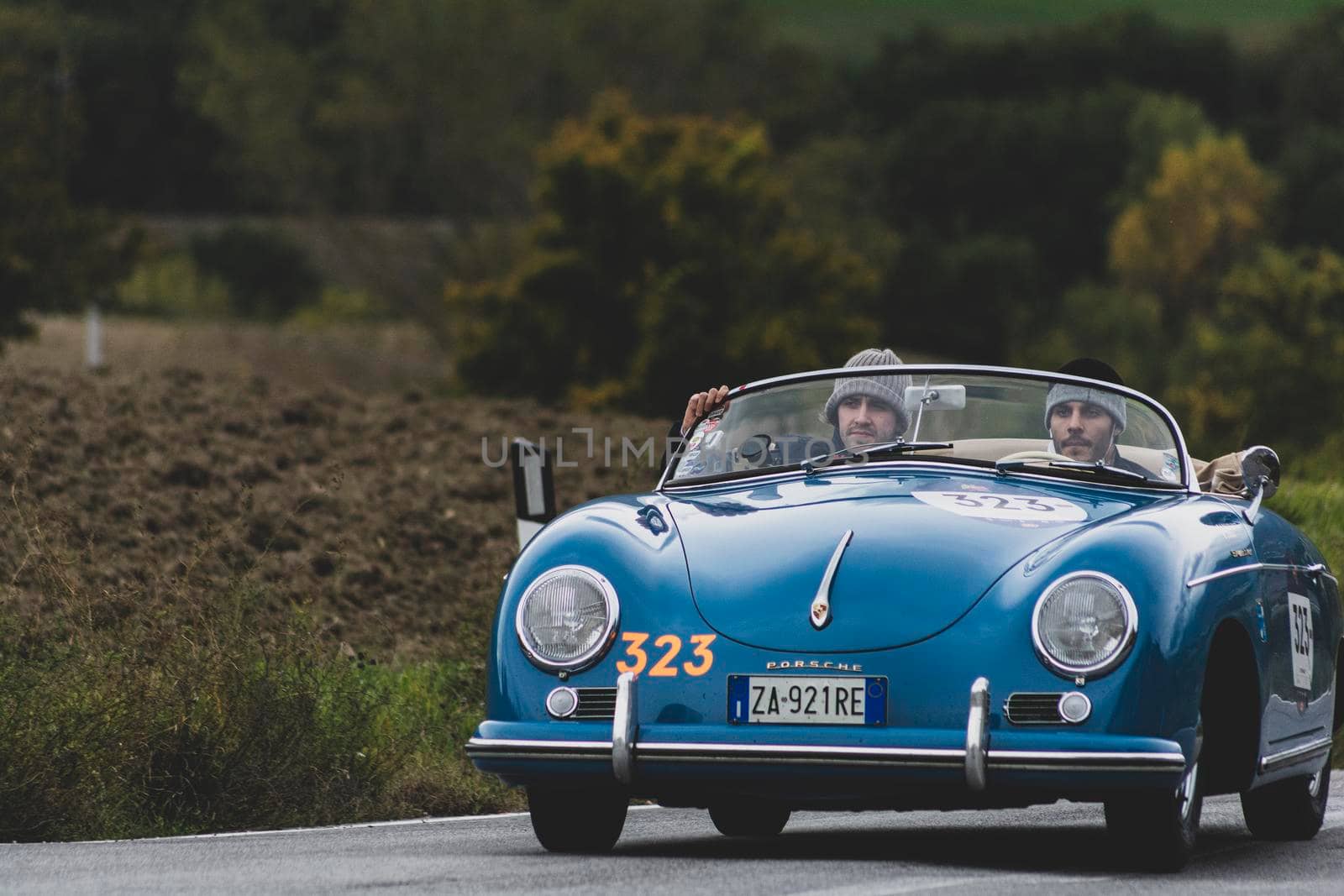 CAGLI , ITALY - OTT 24 - 2020 : PORSCHE 356 1500 SPEEDSTER 1955 on an old racing car in rally Mille Miglia 2020 the famous italian historical race (1927-1957