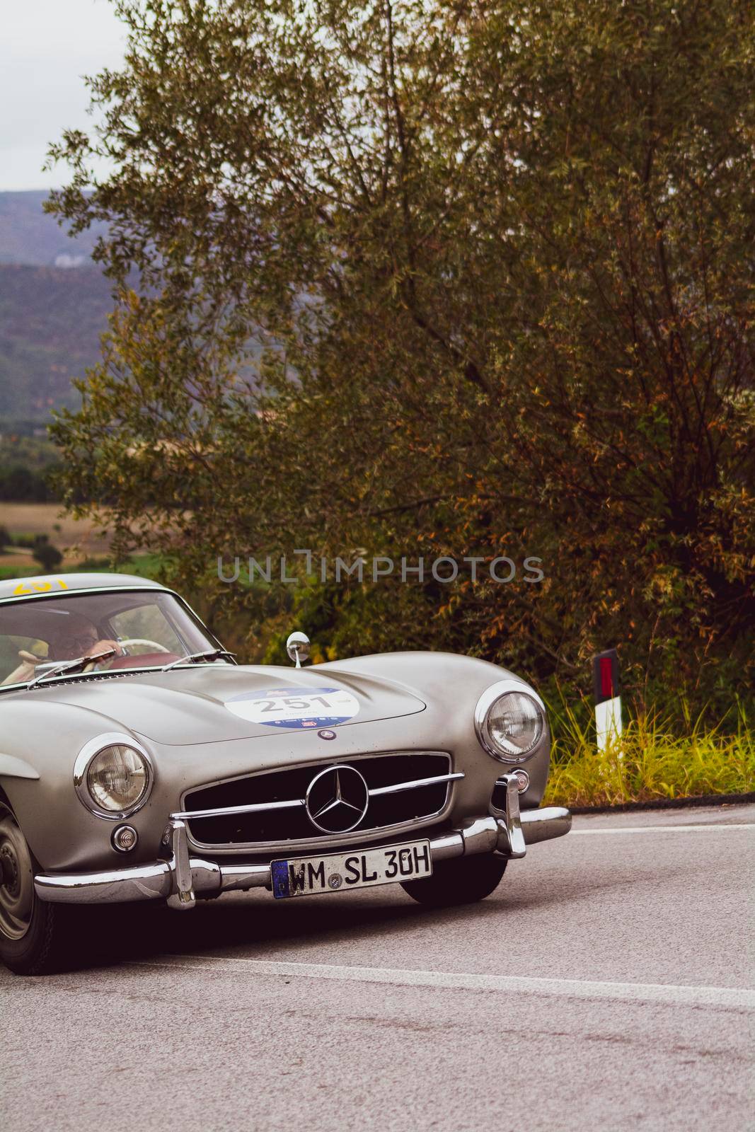 CAGLI , ITALY - OTT 24 - 2020 : MERCEDES-BENZ 300 SL W 198 1954 an old racing car in rally Mille Miglia 2020 the famous italian historical race (1927-1957)