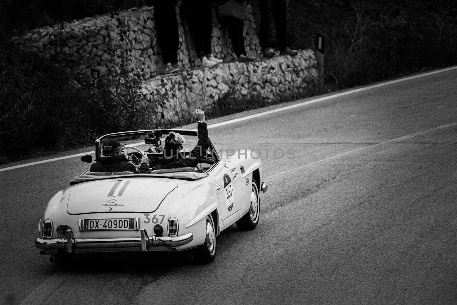 CAGLI , ITALY - OTT 24 - 2020 : MERCEDES-BENZ 190 SL 1956 on an old racing car in rally Mille Miglia 2020 the famous italian historical race (1927-1957