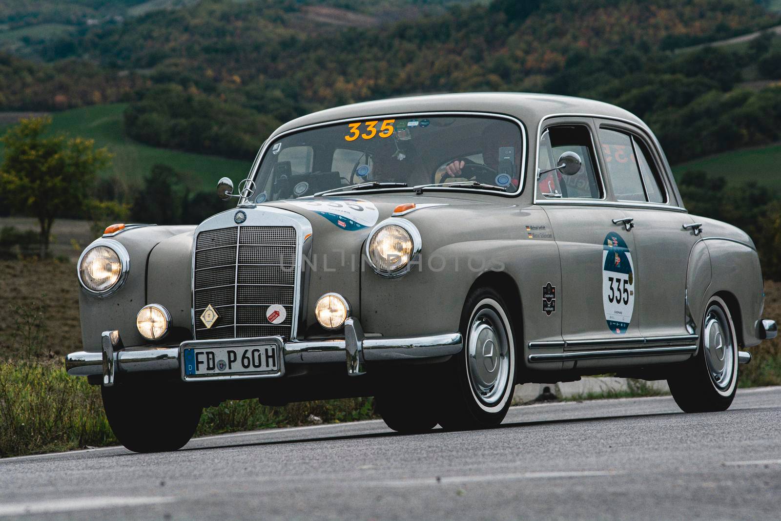 CAGLI , ITALY - OTT 24 - 2020 : MERCEDES-BENZ 220 A 1955 an old racing car in rally Mille Miglia 2020 the famous italian historical race (1927-1957)