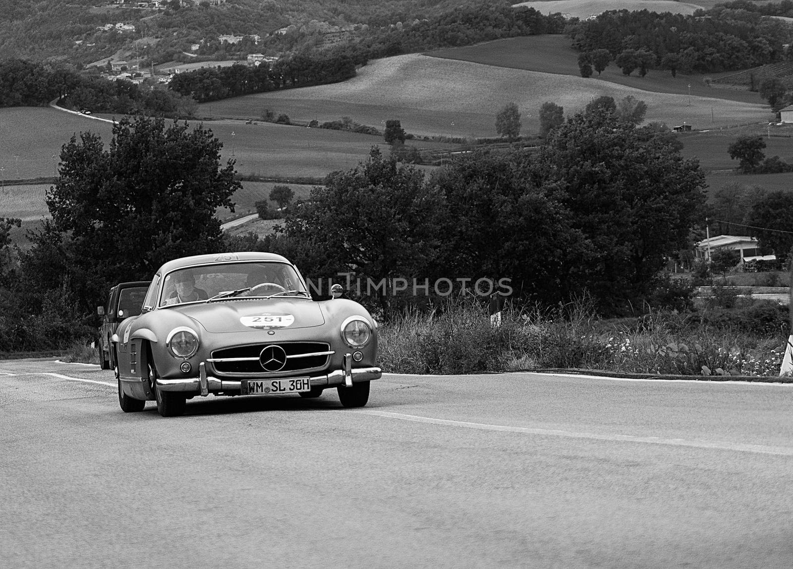 CAGLI , ITALY - OTT 24 - 2020 : MERCEDES-BENZ 300 SL W 198 1954 an old racing car in rally Mille Miglia 2020 the famous italian historical race (1927-1957)